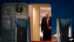 President Donald Trump arrives on Air Force One, Dec. 4, 2019, at Andrews Air Force Base, Md., following a trip to the NATO Summit in England.