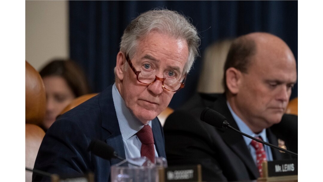 FILE - House Ways and Means Committee Chairman Richard Neal, D-Mass., who is demanding President Donald Trump's tax returns for six years, is joined at right by Rep. Tom Reed, R-N.Y., at a hearing on taxpayer noncompliance in Washington.