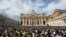 FILE - The faithful gather in front of St. Peter's Basilica as Pope Francis leads the Regina Coeli prayer in Saint Peter's Square at the Vatican, Sept. 17, 2017.