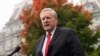 White House chief of staff Mark Meadows speaks with reporters at the White House, Oct. 21, 2020, in Washington. 