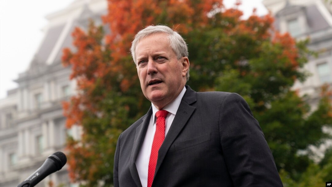 White House chief of staff Mark Meadows speaks with reporters at the White House, Oct. 21, 2020, in Washington. 