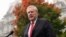 White House chief of staff Mark Meadows speaks with reporters at the White House, Oct. 21, 2020, in Washington. 