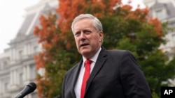 FILE - Mark Meadows, then the White House chief of staff, speaks with reporters at the White House, Oct. 21, 2020, in Washington. 
