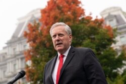 White House chief of staff Mark Meadows speaks with reporters at the White House, Oct. 21, 2020, in Washington.
