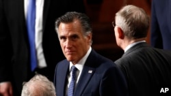 Sen. Mitt Romney, R-Utah, arrives before President Donald Trump delivers his State of the Union address to a joint session of Congress on Capitol Hill, Feb. 4, 2020.