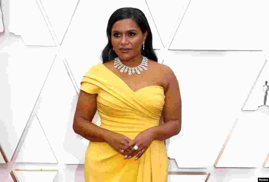 Mindy Kaling poses on the red carpet during the Oscars arrivals at the 92nd Academy Awards in Hollywood, Feb. 9, 2020. 