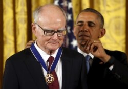 FILE - Then-President Barack Obama presents the Presidential Medal of Freedom to attorney William Ruckelshaus during an event in the East Room of the White House in Washington, Nov. 24, 2015.