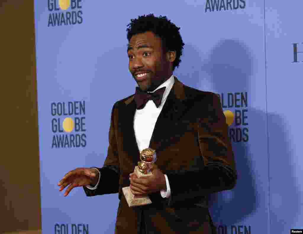 Donald Glover holds the award for Best Performance by an Actor in a Television Series - Musical or Comedy for his role in "Atlanta" during the 74th Annual Golden Globe Awards in Beverly Hills, CA, Jan. 8, 2017. 