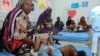 FILE - Children suffering from malnutrition, are treated at Port Sudan Paediatric Center, during a visit by WHO Director-General Tedros Adhanom Ghebreyesus to the country, in Sudan, Sept. 7, 2024. 