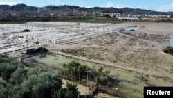 Foto yang diambil dengan drone menunjukkan wilayah di Kota Licata, Italia, terendam banjir pada 20 Oktober 2024. (Foto: Reuters/Danilo Arnone)