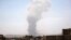 Smoke rises after a Saudi-led airstrike hit a site believed to be one of the largest weapons depots on the outskirts of Yemen's capital, Sana'a, May 22, 2015.