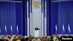 Президент России Владимир Путин выступает со своим ежегодным посланием Федеральному Собранию в Москве, Россия, 21 февраля 2023 года.