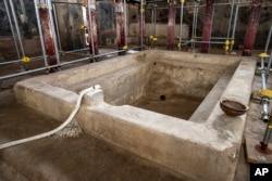 A picture released by the Pompeii Archeological Park Press Office, Friday, January 17, 2025, showing a private bathhouse recently discovered in the Pompeii archeological site. (Archeological Park of Pompeii Press Office Via AP, HO)