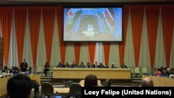 South Sudan President Salva Kiir (on screen) addresses via video teleconferencing a high-level meeting on his country, held on the margins of the general debate of the U.N. General Assembly’s 70th session.