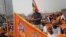 Supporters of Vishwa Hindu Parishad gather during a rally in New Delhi, Dec. 9, 2018. The group gathered thousands of supporters to demand the construction of a Hindu temple on a site where a mosque was attacked, demolished in 1992.