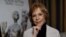 FILE - Actress Carol Burnett poses for a portrait in Pasadena, California, Jan. 7, 2016.
