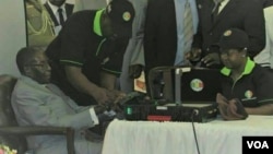 President Robert Mugabe registering to vote as Zimbabwe prepares for 2018 general elections.