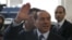 Former Italian Prime Minister Silvio Berlusconi arrives at the central train station, Milan, Dec. 29, 2012.