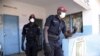 Police officers with face masks in Dakar, Senegal