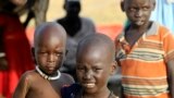 FILE: South Sudanese children are pictured at a refugee camp which was inundated by floods from the White Nile near in al-Qanaa in southern Sudan. Taken 9.14.2021