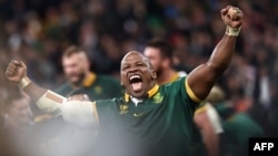 FILE - South Africa's hooker Bongi Mbonambi celebrates after South Africa won the France 2023 Rugby World Cup Final match between New Zealand and South Africa at the Stade de France in Saint-Denis, on the outskirts of Paris, on October 28, 2023.