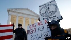 Gun-rights supporters demonstrate in front of state Capitol in Richmond, Va., Jan. 20, 2020.