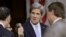 Senate Foreign Relations Chairman Senator John Kerry, President Barack Obama's nominee to become secretary of state, gives a 'thumbs-up' as he arrives before his confirmation hearing to testify before the committee to replace Hillary Rodham Clinton, on Ca