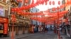 Pedestrians walk through the almost deserted streets of London&#39;s China Town district. As the deadly 2019-nCov strain of coronavirus has spread worldwide, it has carried with it xenophobia -- and Asian communities around the world are finding themselves subject to suspicion and fear.