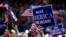 Delegates wave signs and flags during the final day of the Republican National Convention in Cleveland, July 21, 2016. 