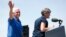 Vice President Mike Pence waves to supporters as U.S. Sen. Joni Ernst, R-Iowa, speaks during her annual fundraiser, June 3, 2017, in Boone, Iowa.