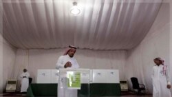 A Saudi man casts his ballot during municipal elections in Riyadh, Saudi Arabia, Thursday, Sept. 29, 2011. King Abdullah of Saudi Arabia granted women on Sept. 25, 2011, the right to vote and run in municipal elections from 2015 onwards, a historic first 