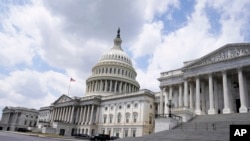 FILE - The U.S. Capitol is seen on June 13, 2023, on Capitol Hill in Washington. Congress is returning to Capitol Hill to try to avert a government shutdown, while House Republicans also consider whether to press forward on an impeachment inquiry into President Joe Biden. 