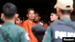 Labor activist Rath Rott Mony arrives at the Phnom Penh Municipal Court for trial over his role in the making of a documentary about sex-trafficking, that the government said contained fake news, in Phnom Penh, Cambodia May 30, 2019. 