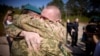 Ukrainian prisoners of war are seen after a swap with Russian POWs, at an unknown location in Ukraine, Sept. 14, 2024. (Ukrainian President Volodymyr Zelenskyy on Telegram via Reuters)