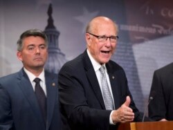 FILE - Kansas Sen. Pat Roberts, right , Sen. Cory Gardner of Colorado, speaks Nov. 5, 2015, during a news conference on Capitol Hill in Washington.