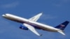 Russian Tupolev-214 airplane with the Open Skies sign featured at the Russian Defense Ministry Wensite