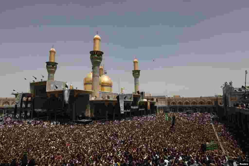 Shi&#39;ite pilgrims gather at Imam Moussa al-Kadhim shrine to mark his death anniversary in Baghdad&#39;s Kadhimiya district. 