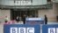 BBC workers place barriers near to the main entrance of the BBC headquarters and studios in Portland Place, London, Britain.