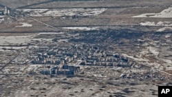 FILE - An aerial view of Vuhledar, the site of heavy battles with the Russian troops in the Donetsk region, Ukraine, Feb. 10, 2023. (AP Photo/Libkos)
