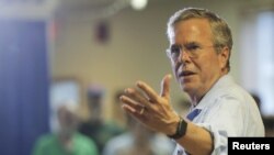 Republican presidential candidate Jeb Bush answers a question from the audience during a town hall campaign stop at the VFW Post in Hudson, New Hampshire, July 8, 2015.