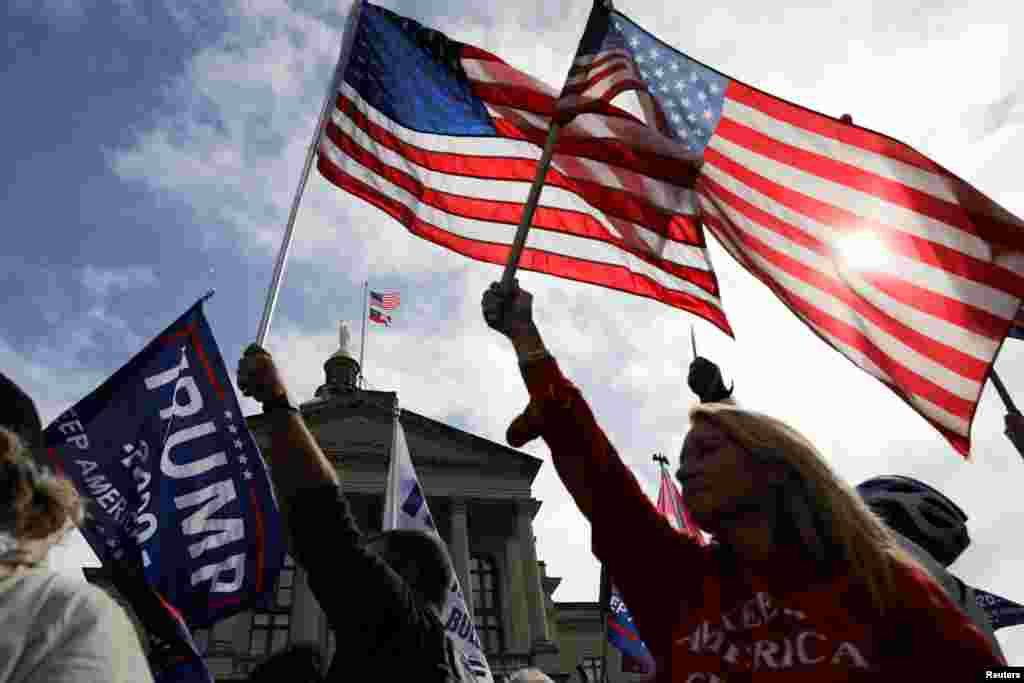 Supporters of U.S. President Donald Trump participate on a &#39;Stop the Steal&#39; protest at the Georgia State Capitol.