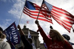 Supporters of U.S. President Donald Trump participate on a 'Stop the Steal' protest at the Georgia State Capitol.