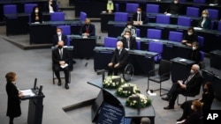 Holocaust survivor Charlotte Knobloch, left, delivers a speech at the German Federal Parliament at the Reichstag building in Berlin, Jan. 27, 2021, on the International Holocaust Remembrance Day. 