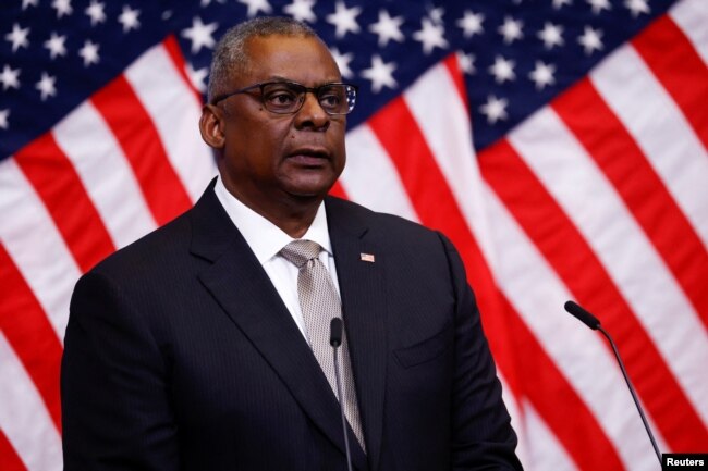 FILE - U.S. Secretary of Defence Lloyd Austin attends a news conference during a NATO Defence Ministers meeting in Brussels, Belgium October 12, 2022. (REUTERS/Yves Herman)