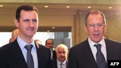 Suriya prezidenti Bashar al-Assad va Rossiya Tashqi ishlar vaziri Sergey Lavrov Damashqda, 7-fevral, 2012-yil