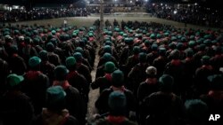 Fotografía de archivo de miembros del Ejército Zapatista de Liberación Nacional, EZLN, asisten a un evento que marca el 30 aniversario del levantamiento zapatista en Dolores Hidalgo, Chiapas, México, el domingo 31 de diciembre de 2023.