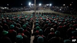 Miembros del Ejército Zapatista de Liberación Nacional, EZLN, asisten a un evento que marca el 30 aniversario del levantamiento zapatista en Dolores Hidalgo, Chiapas, México, el domingo 31 de diciembre de 2023.