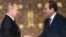Russian President Vladimir Putin, left, Egyptian President Abdel-Fattah El-Sissi, shake hands after a news conference following their talks in Cairo, Egypt, Dec. 11, 2017. 
