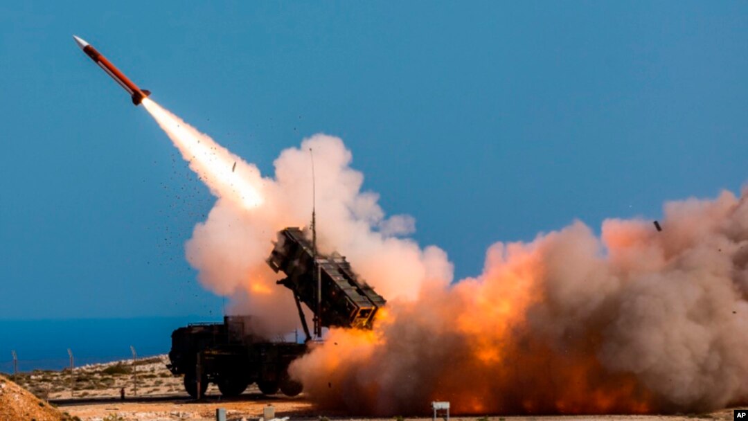 FILE - In this Nov. 8, 2017, photo from the U.S. Department of Defense, soldiers fire the Patriot weapons system at the NATO Missile Firing Installation in Greece. Sources say - unofficially - the U.S. is preparing to send the system to Ukraine to shoot incoming Russian missiles.