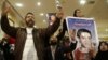 Families of the victims of the Ultras Al-Ahli football supporters react in court after the issuance of the death penalty for 21 accused in last years Port Said football violence, in Cairo, Egypt, January 26, 2013.